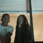 Lex Scott Davis as Nya and Joivan Wade as Isaiah, waiting for Dmitri.